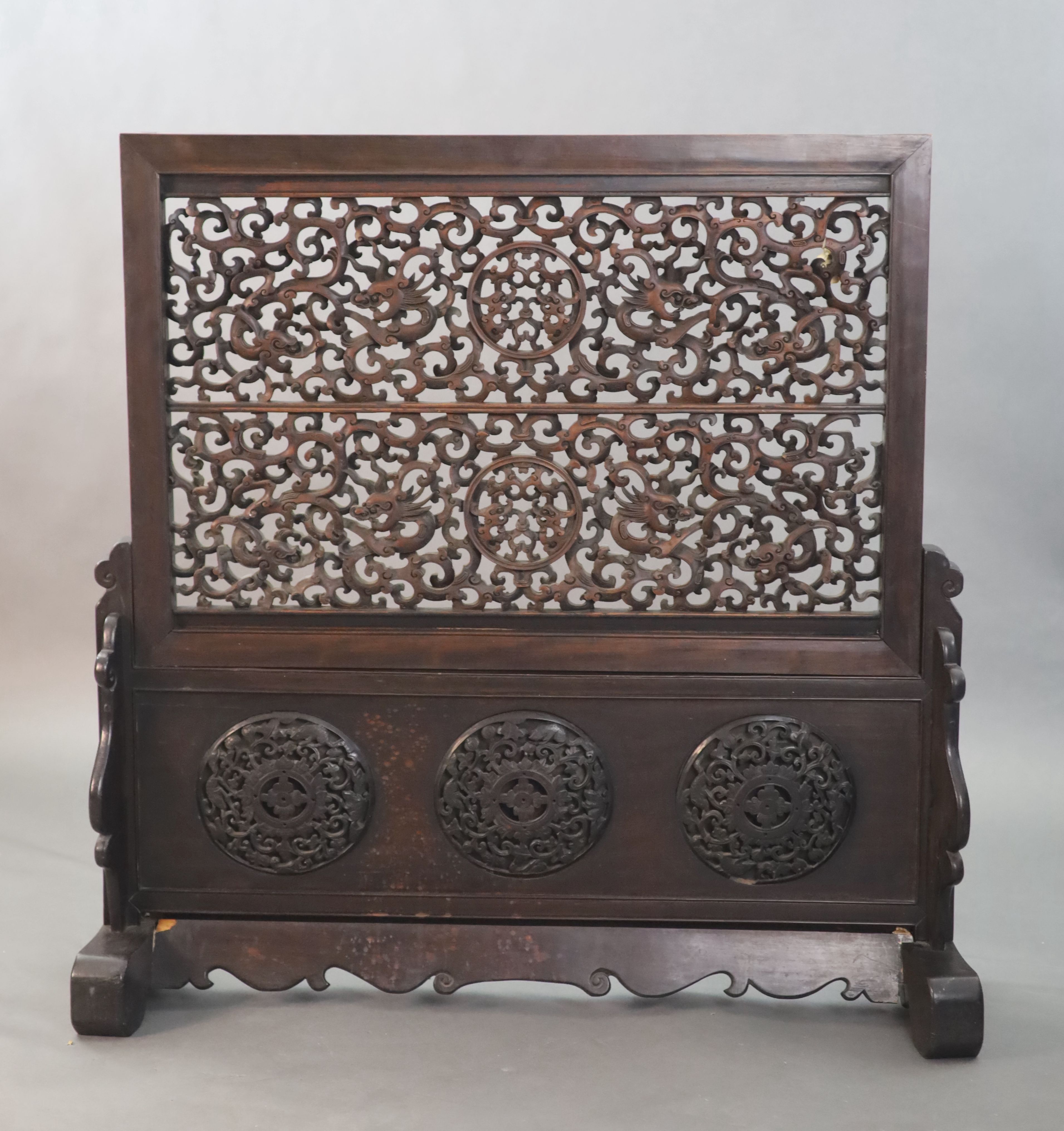 A large Chinese hardwood table screen, c.1910, 93.5cm high, 93.5cm wide, Provenance - A. T. Arber-Cooke